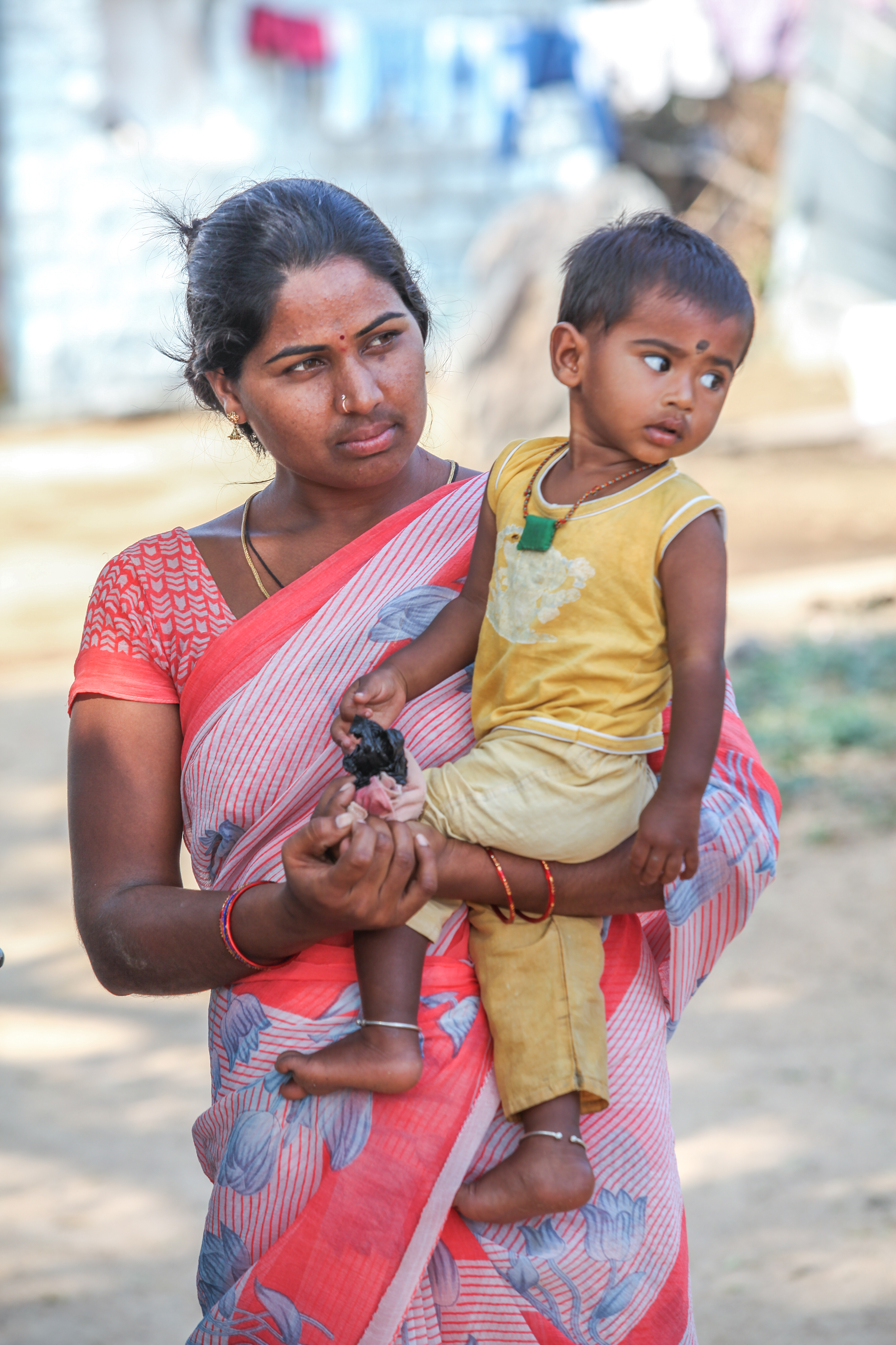 Mother holding boy child