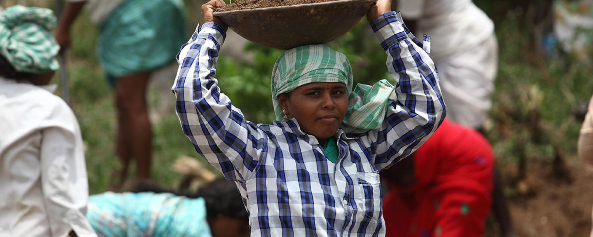 women carrying a bowl on her head 