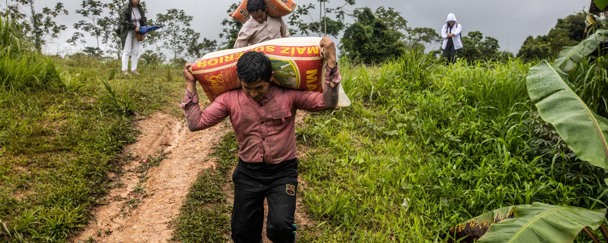 Man carrying maize