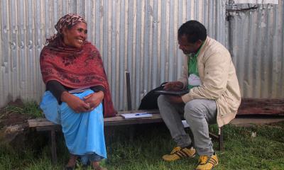 Lady being interviewed as part of the survey