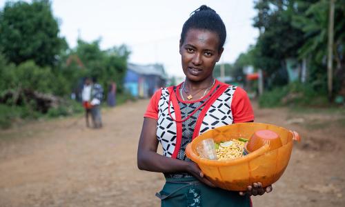 Girl selling nifro, Ethiopia