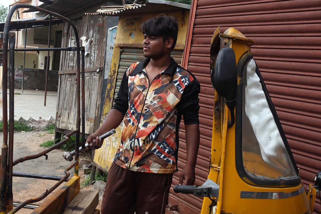 man working on a car 
