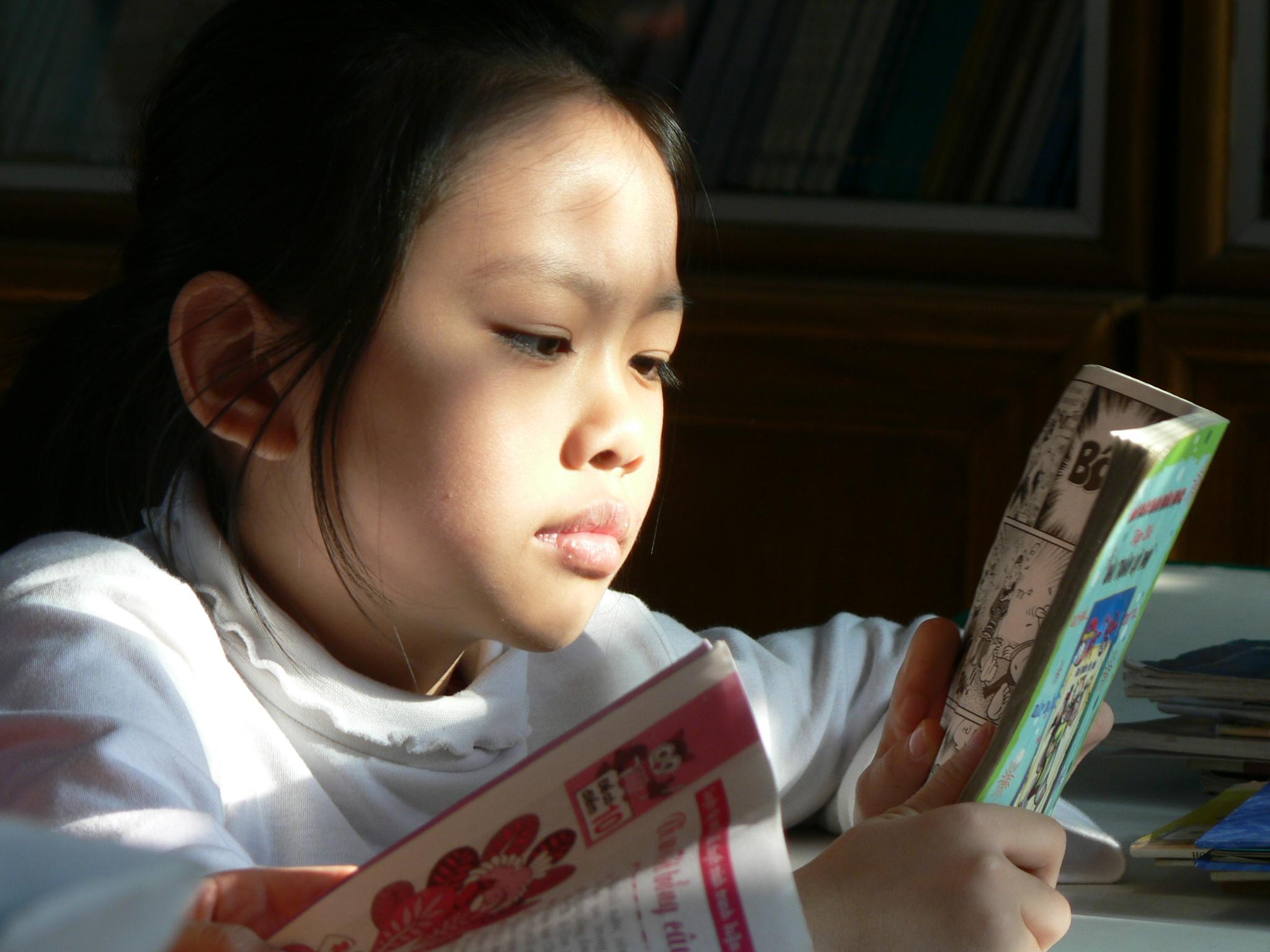 girl reading in the sun