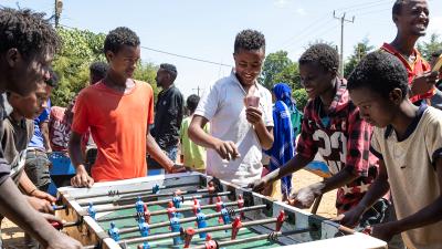 boys playing table football