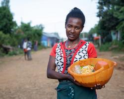 Girl selling nifro, Ethiopia