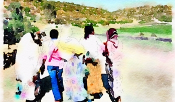 Girls walking down a pathway