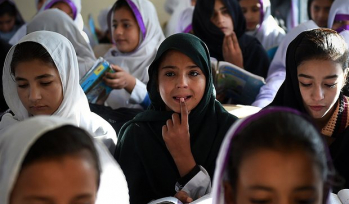 The millennium development goals were credited with getting girls in school, but not tackling underlying inequality which prevents them from fulfilling their potential. How can the SDGs succeed in achieving its aims to end gender discrimination? Photograp Students in a classroom
