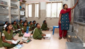Teacher and students in a classroom