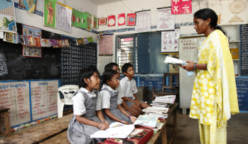 Teacher and students in a classroom