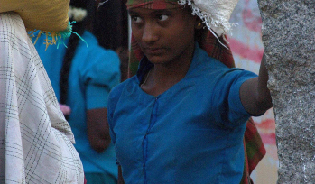 Child carrying a food package