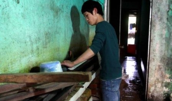 Young man doing carpentry