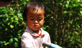 Child playing with water