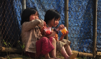 Children eating sweets outside
