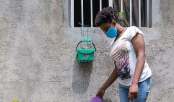 Woman watering flowers