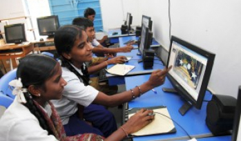 School children working on a computer