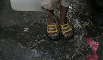Close up of a child's feet in sandals