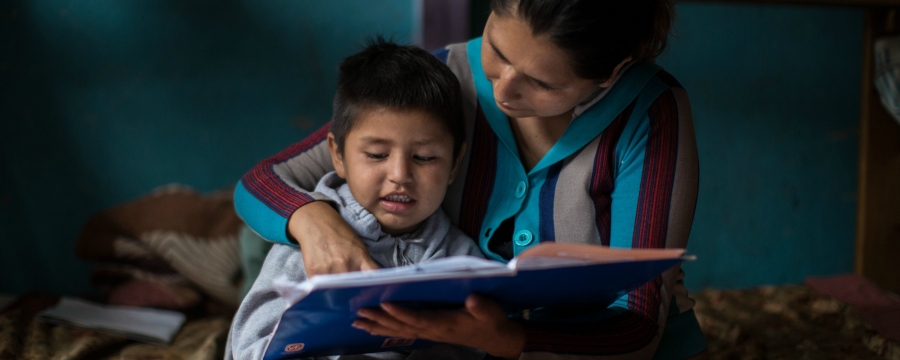 mother and child reading Peru mother and child reading Peru